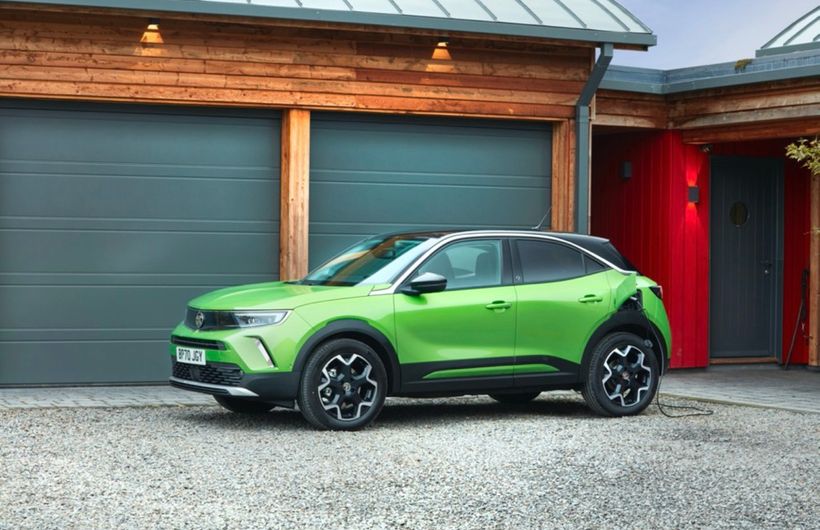 Vauxhall Mokka e electric car charging on driveway